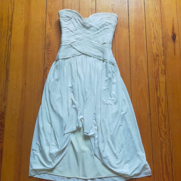 White BCBG (XXS) strapless dress with bandage style top and highlow hem. - Picture 1 of 4